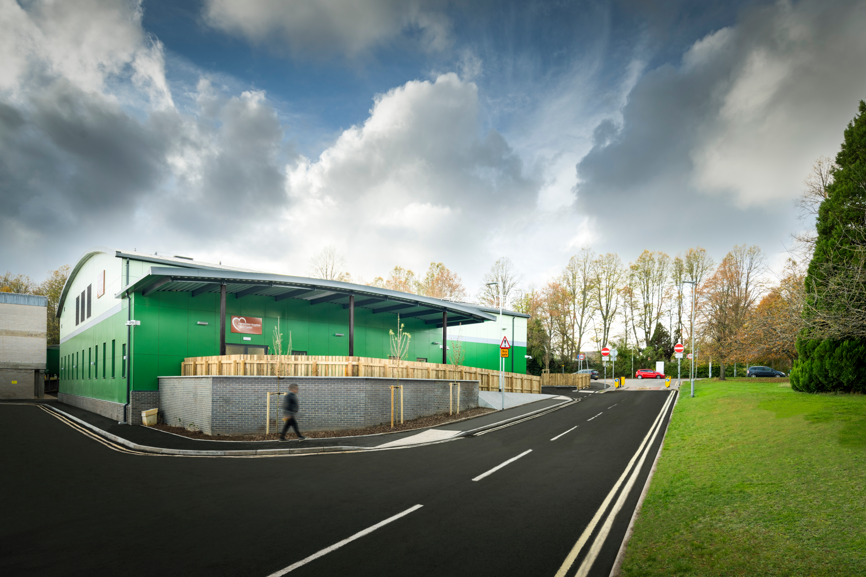 Photograph of the cardiac catheterisation laboratory at Basingstoke, with a barrel vaulted roof and green external cladding.