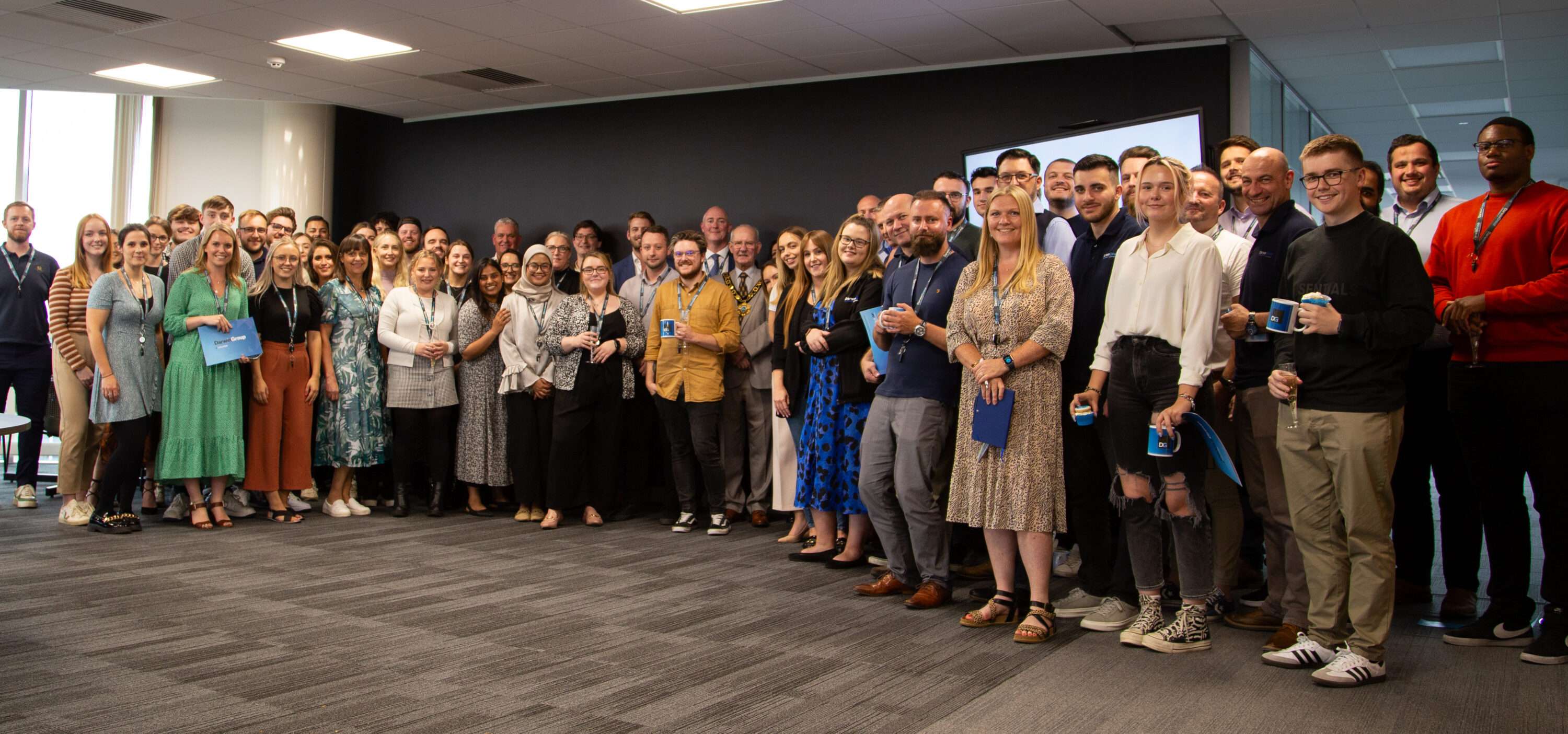 The Darwin Group HQ team, gathered for a group photo after the opening ceremony for our new office in Telford.